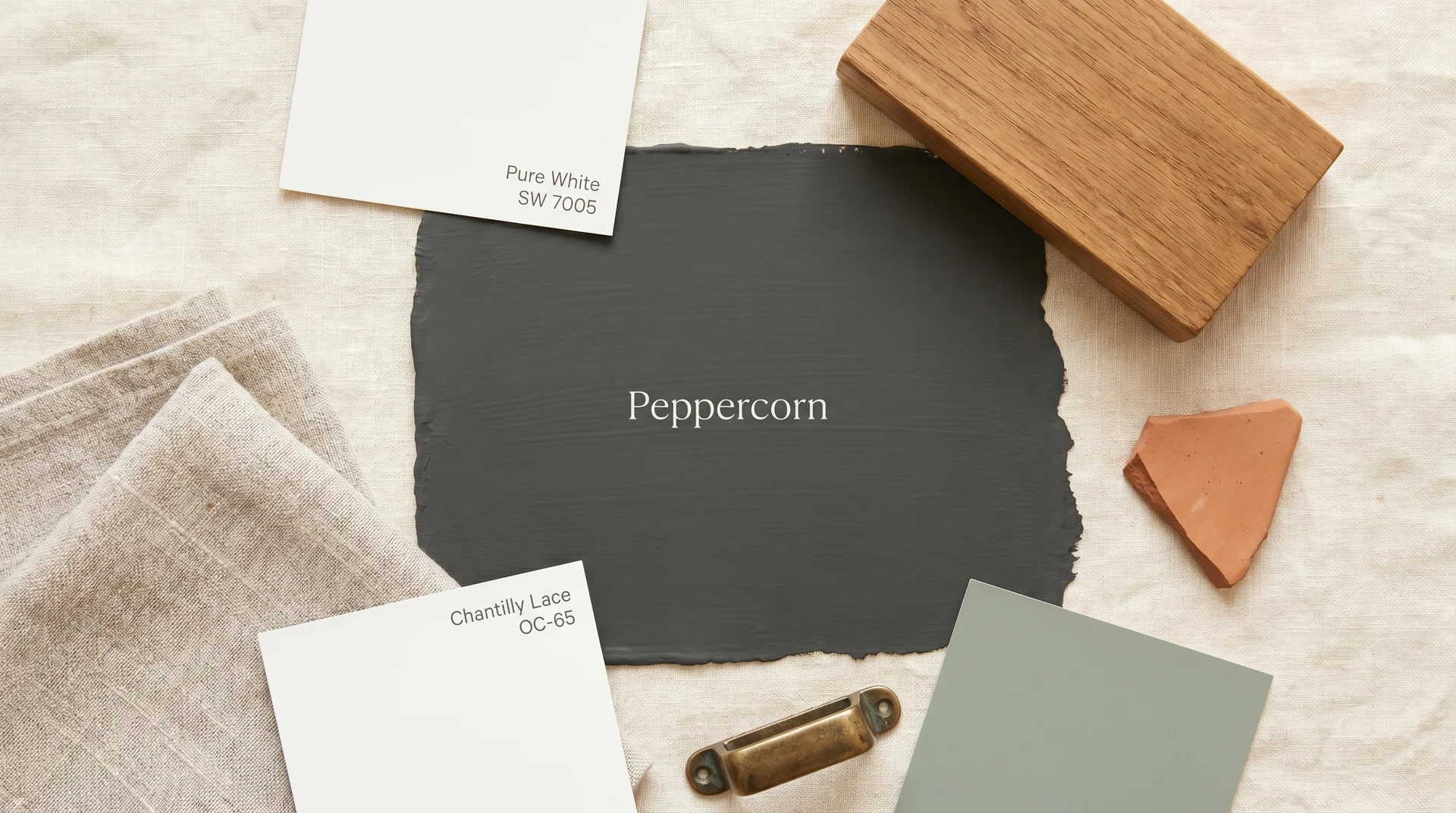 Peppercorn SW 7674 coordinating color palette with crisp white trim, sage, brass, and warm oak samples