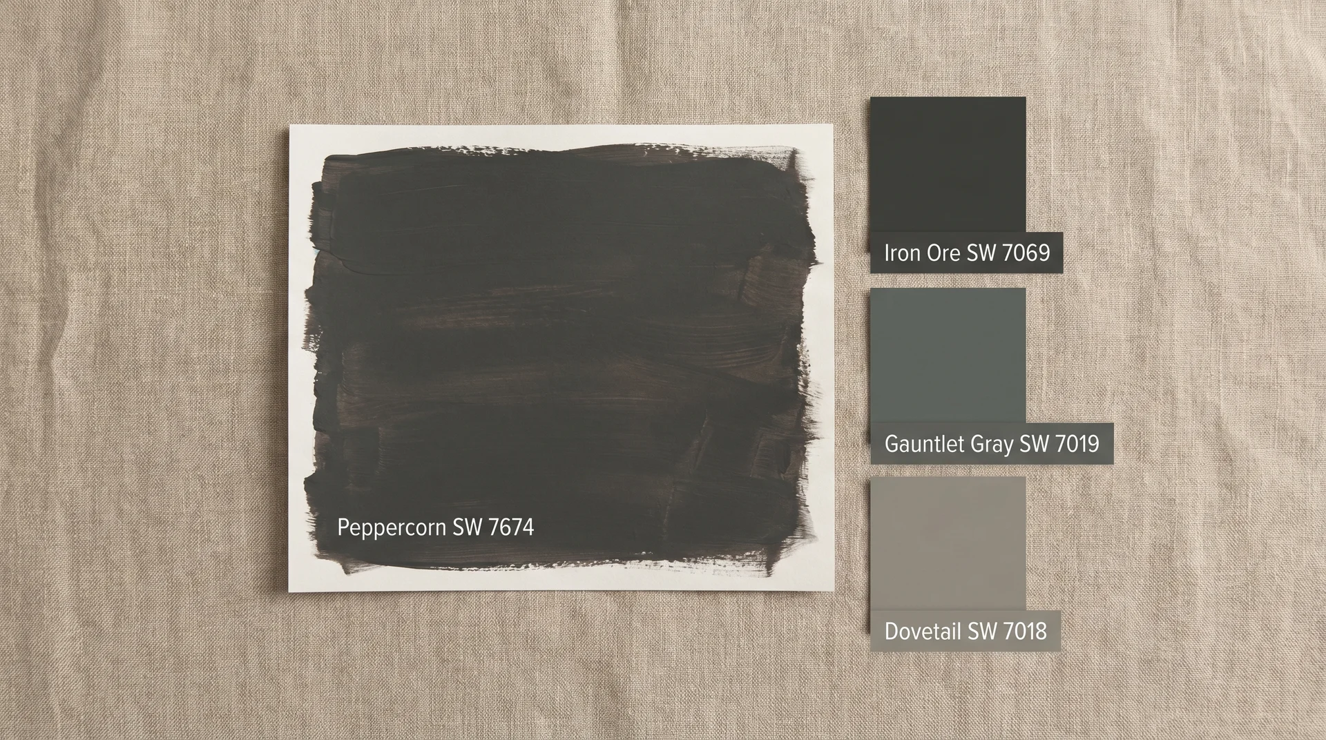 Peppercorn SW 7674 paint swatch compared to Iron Ore, Gauntlet Gray, and Dovetail on linen surface